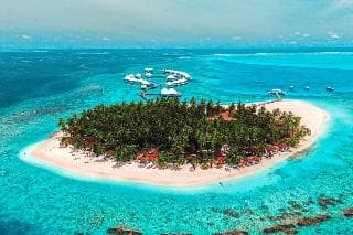 Stay at Diamonds Thudufushi Beach & Water Villas