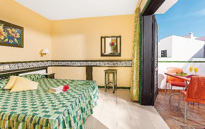 Stay at Apartamentos Puerto Caleta